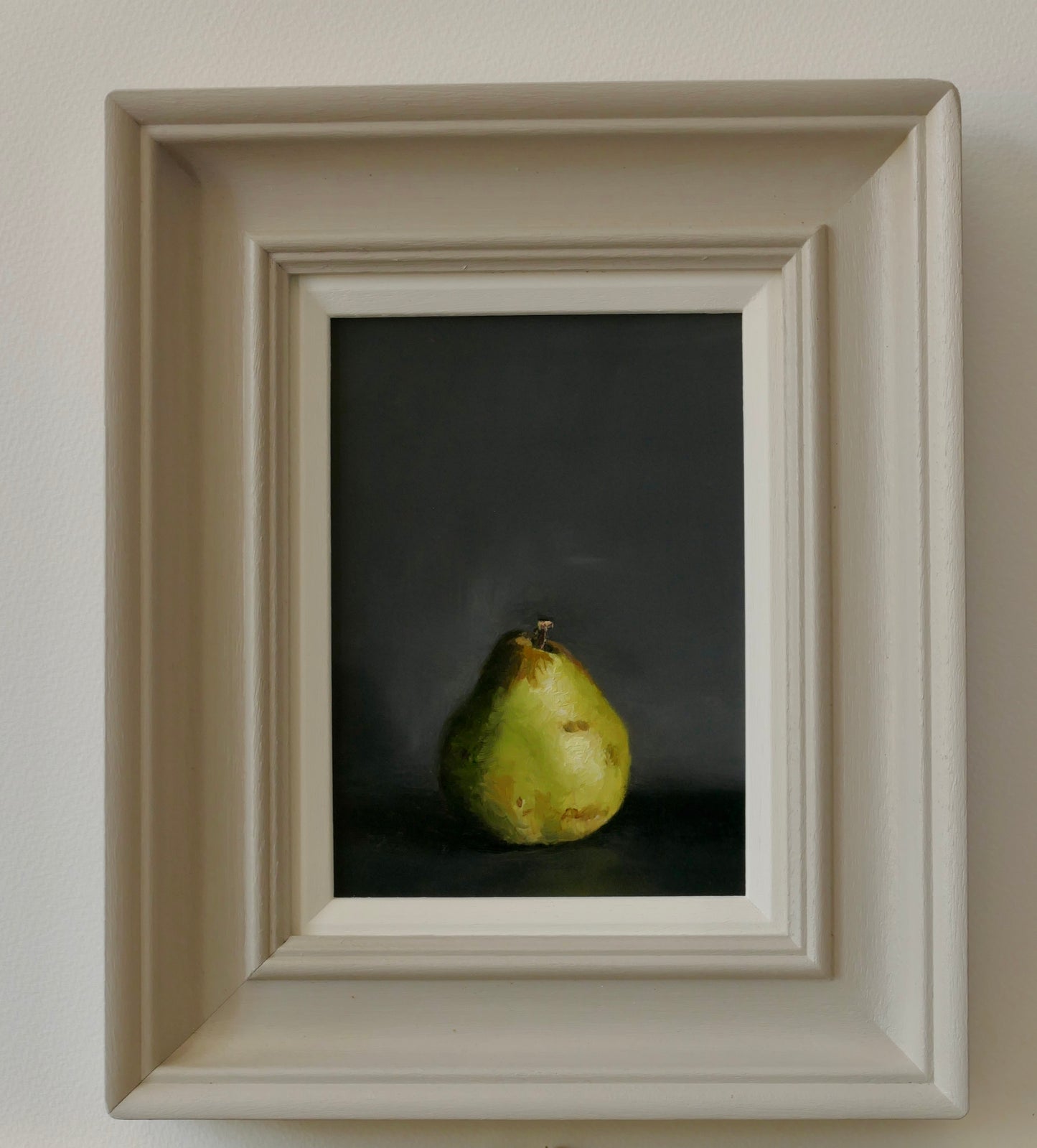 Pear with dark background.
