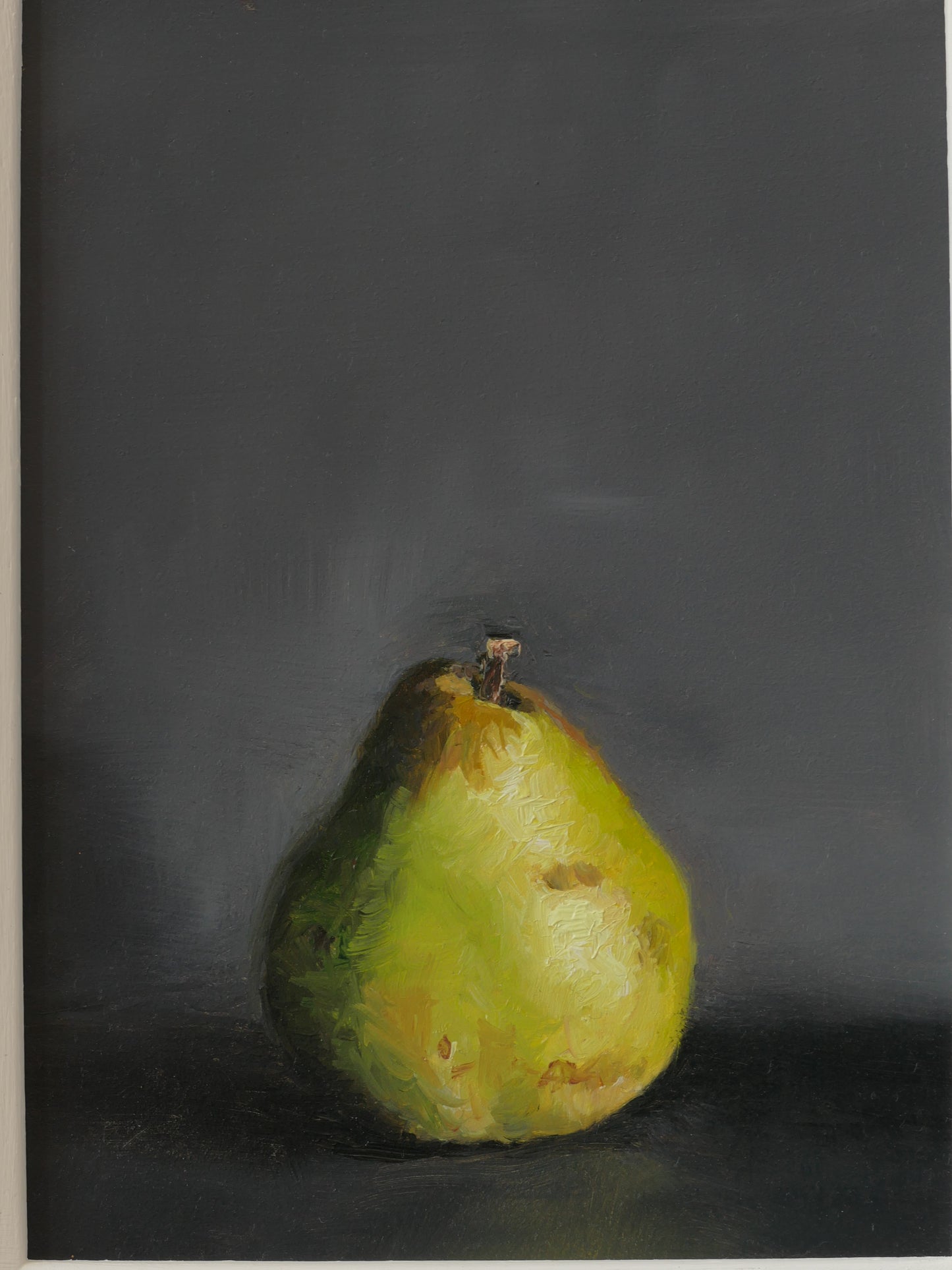 Pear with dark background.